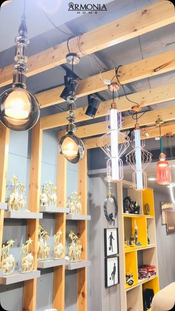 Pendant lights and gold figurines